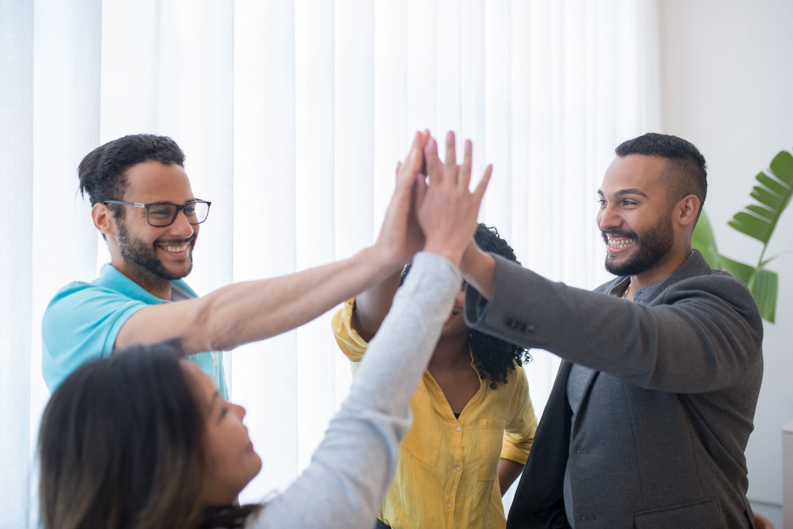 Get employees to celebrating a team recognition milestone with employee gamification software